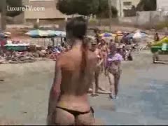 Unsuspecting skinny cuties on the beach captured by a sneaky dude with a voyeur livecam